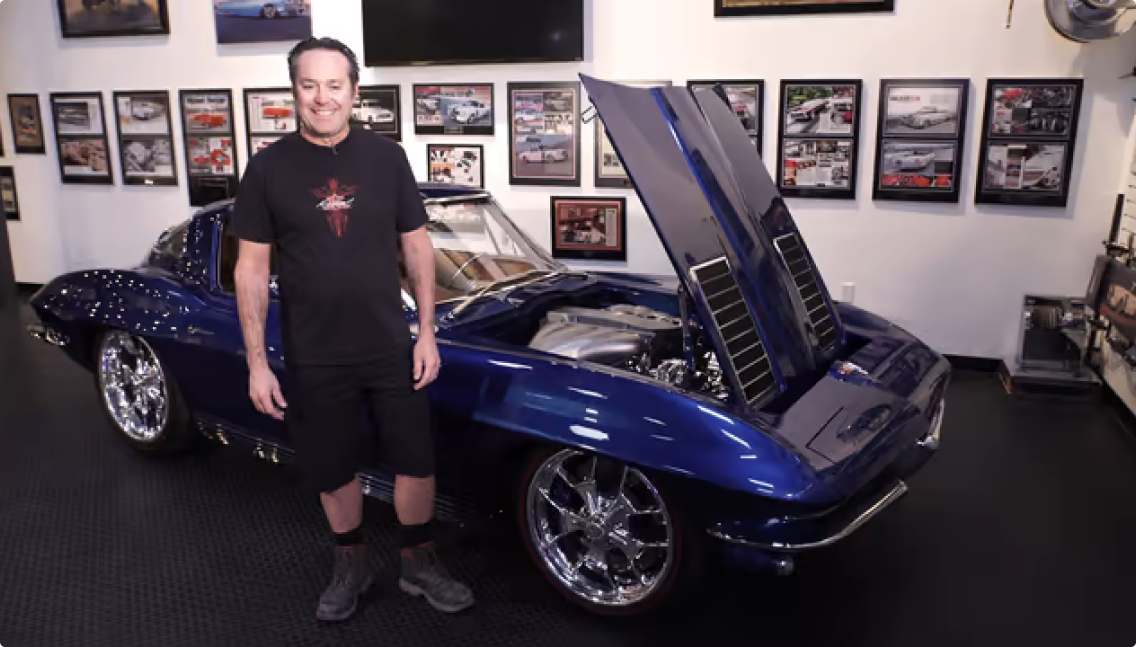 Engineer Will Lockwood in front of a 1963 split-window Corvette